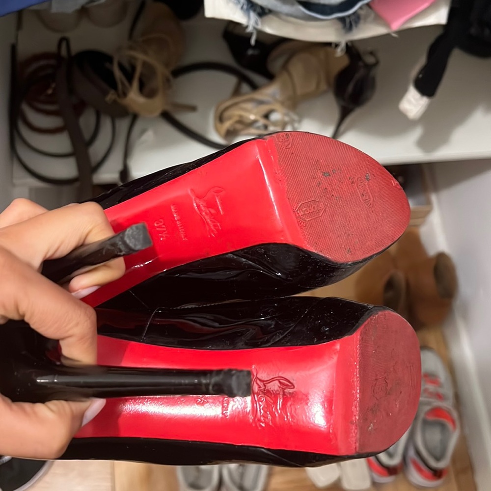 Classic black patent leather authentic louboutin heels go with every outfit.